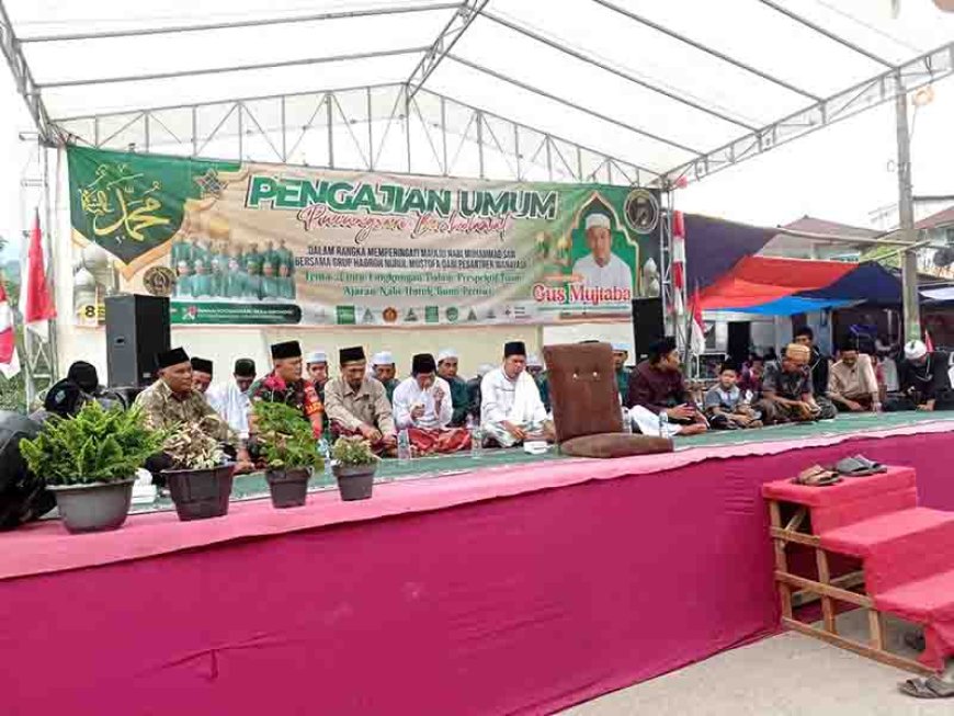 DEKATKAN DIRI DENGAN ULAMA DAN WARGA BABINSA HADIRI PERINGATAN MAULID NABI MUHAMMAD SAW DI WILAYAH BINAAN