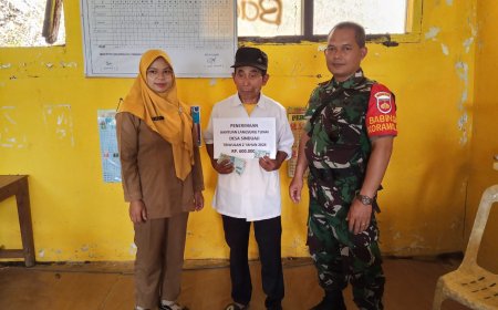 WUJUD PERAN AKTIF,BABINSA DAMPINGI PENYALURAN BLT DANA DESA